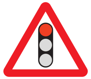 Traffic light sign with red light highlighted